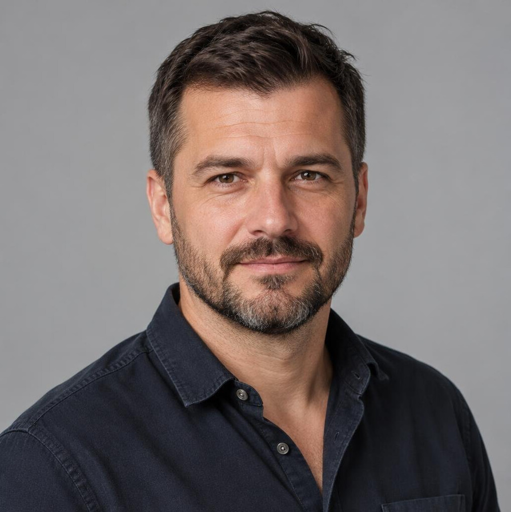 Portrait of a bearded man in a casual shirt